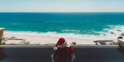 A kid viewing the sea on his holidays 2025.