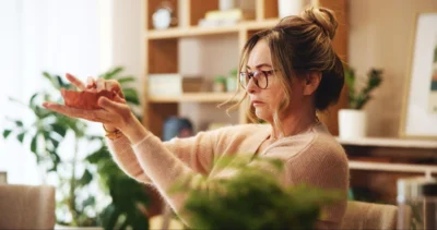 Woman checking sustainable materials for eco-friendly products.